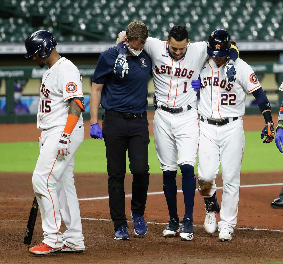 Astros' Correa helped off field with bone bruise after fouling