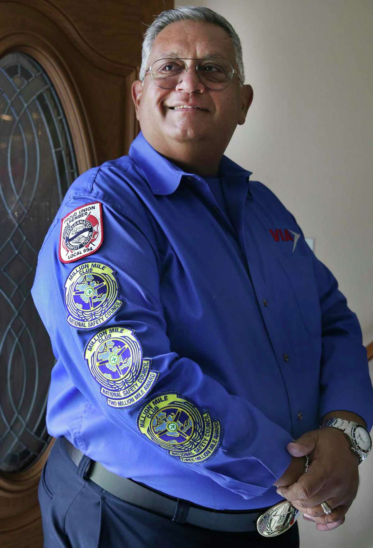 Roy Chapa, a VIA bus operator, etired after 41 years of driving the streets of San Antonio accumulating a whopping 3 million miles. The patches on his work shirt indicate his accomplishments of millions of miles, from the National Safety Council.