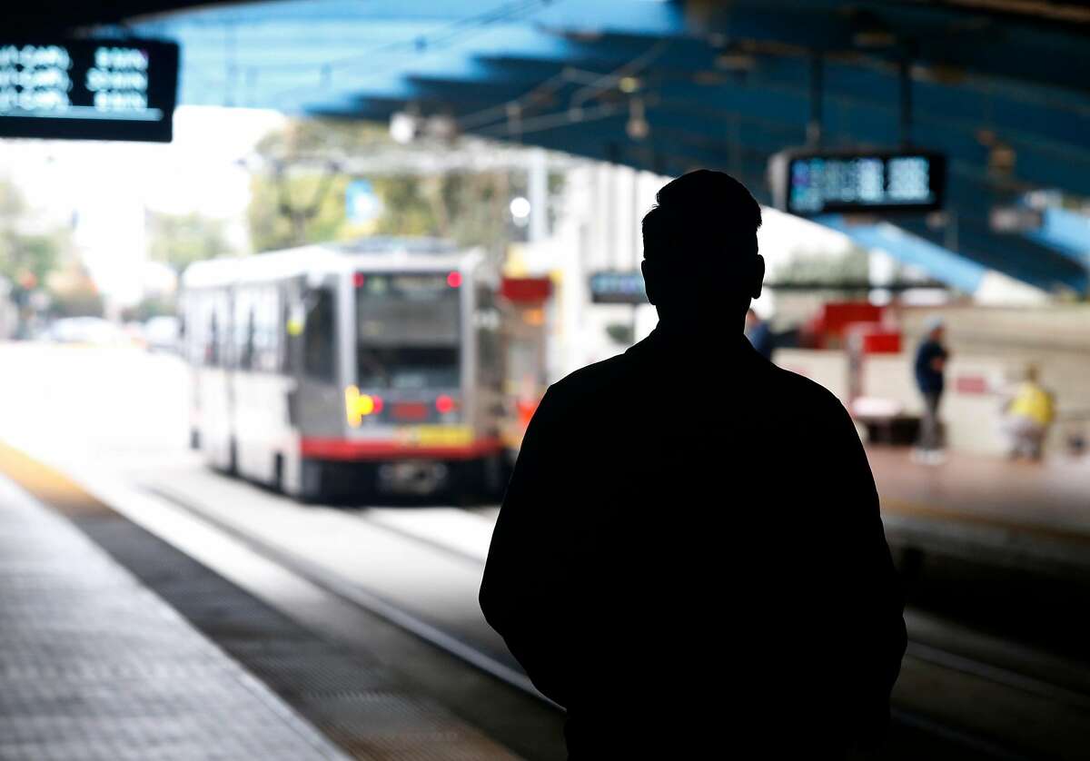 A passenger waits for an inbound train to arrive at the West Portal Muni Metro station in San Francisco, Calif. on Saturday, Aug. 25, 2018. Muni is getting a new rider-information system for $89 million, while ancient, floppy-disk computers still route the trains.
