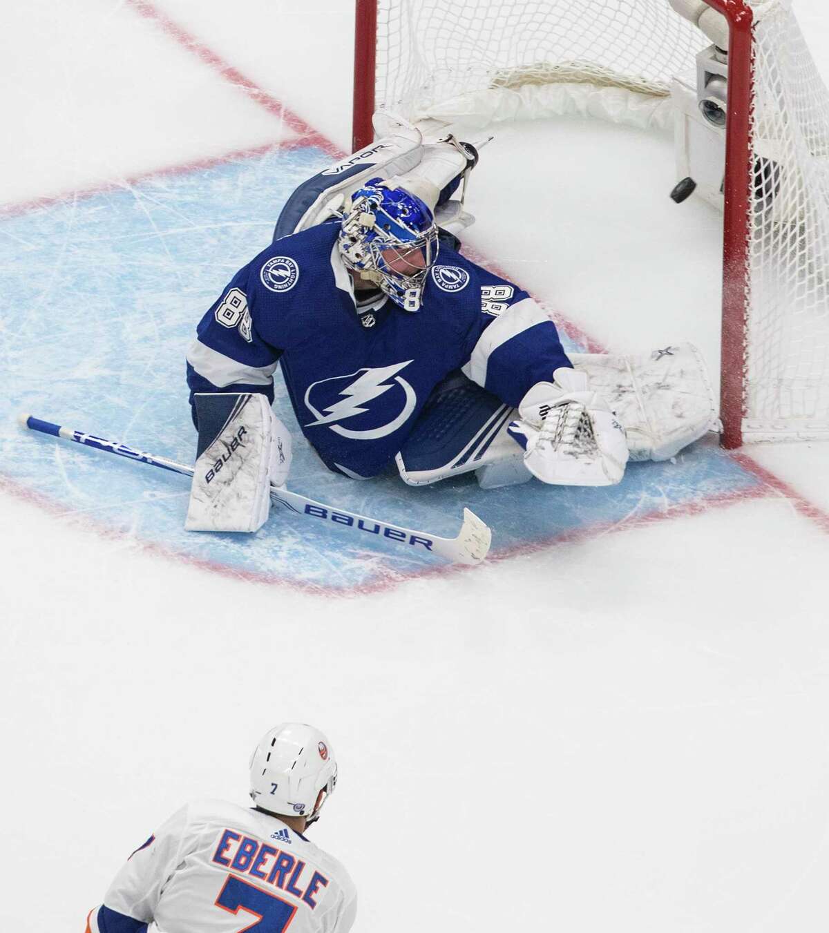 New York Islanders right wing Jordan Eberle (7) scores on Tampa Bay Lightning goaltender Andrei Vasilevskiy (88) during the second overtime in Game 5 of the NHL hockey Eastern Conference final, Tuesday, Sept. 15, 2020, in Edmonton, Alberta. (Jason Franson/The Canadian Press via AP)