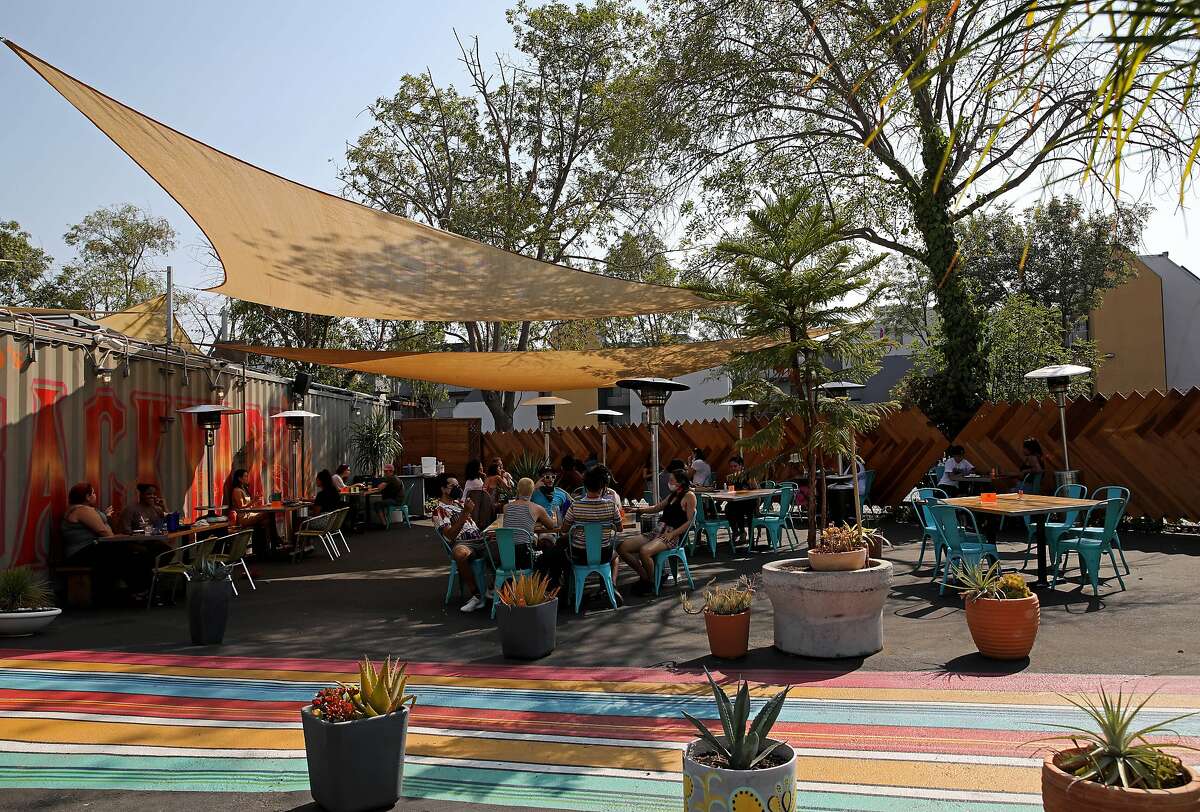 Customers have a dining experience at Nido's Backyard, located at 104 Oak St., on Saturday, September 5, 2020, in Oakland, Calif.