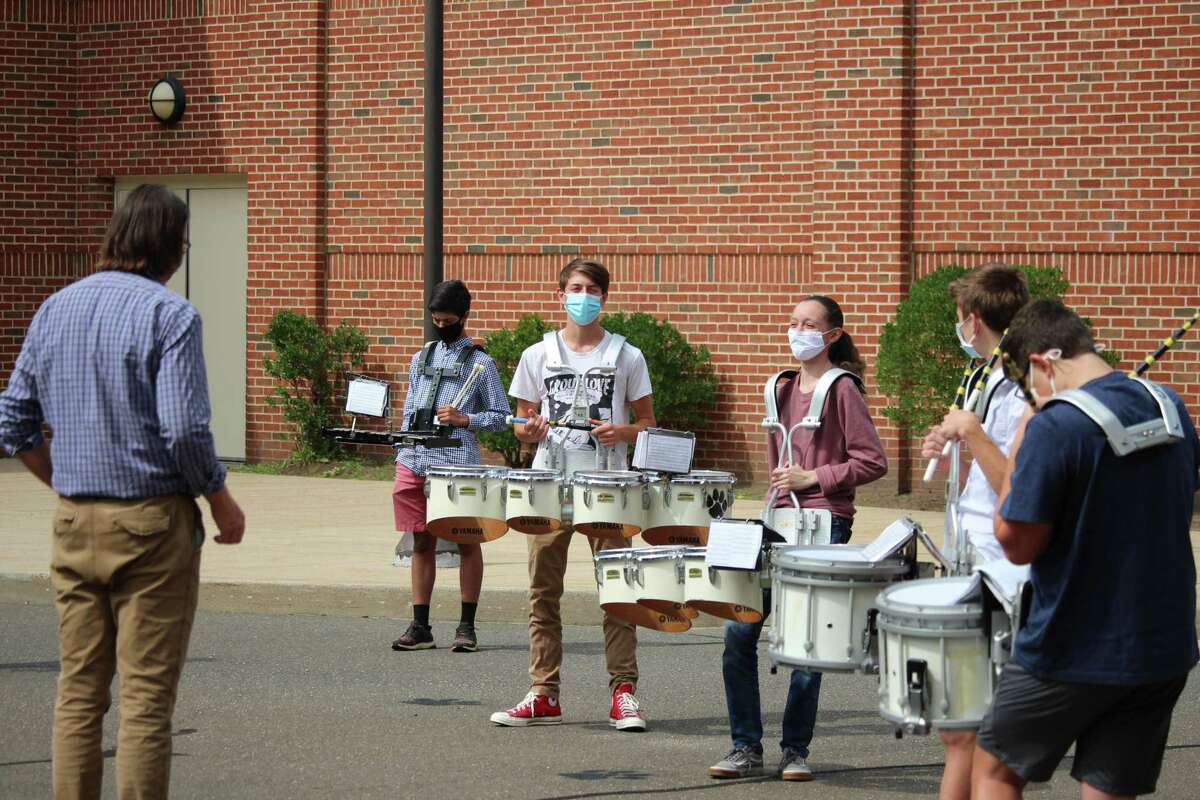 An outdoor band practice at Daniel Hand High School in Madison, Conn. on Sep. 17, 2020, as the school district returns to a hybrid model during the COVID-19 pandemic.