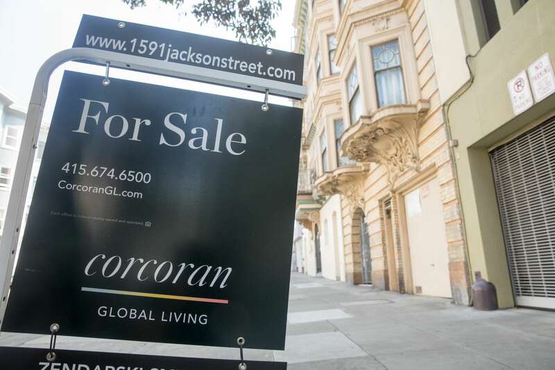 A sign for an apartment for rent hangs outside an apartment building in San Francisco, California on Sept. 16, 2020.