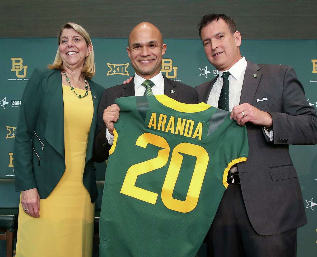 Flanked by Baylor president Dr. Linda A. Livingstone and athletic director Mack Rhoades, Dave Aranda is introduced as the Bears’ new football coach on Jan. 20, 2020. 