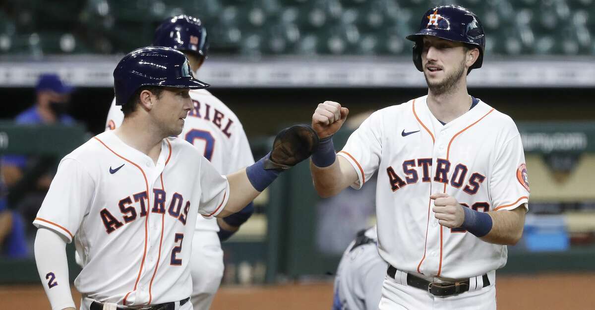 Houston Astros Kyle Tucker (30) celebrates his two-run home run with Alex Bregman (2) during the second inning of an MLB baseball game at Minute Maid Park, Thursday, September 17, 2020, in Houston.