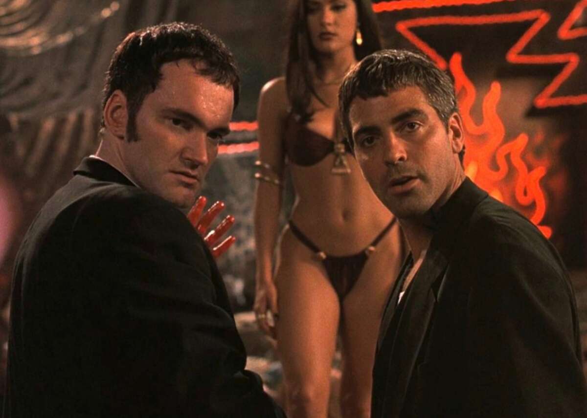 "From Dusk Till Dawn" (1996) Directed by Robert Rodriguez and written by Quentin Tarantino, this might not be a super-scary movie, but it's a great vampire flick for Halloween. It stars George Clooney and Tarantino as criminal brothers whose plans to break free in Mexico are put on pause when they unknowingly enter a truck stop filled with vampires. The movie became a box office and cult success, and led to a two-season TV show on the El Rey television network.