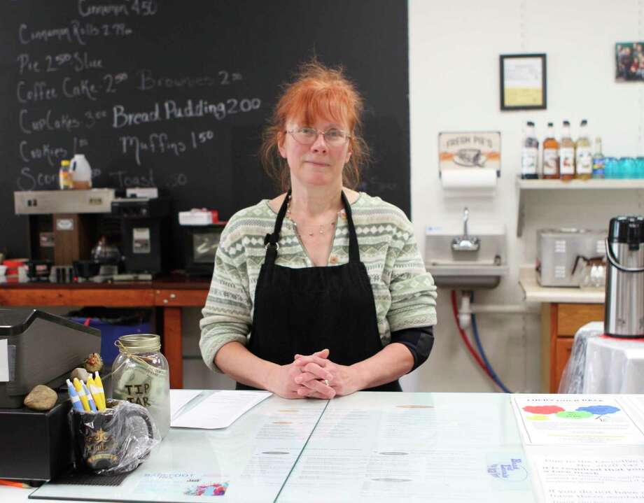 Paula Beilfuss, one of the owners of Three Girls Bakery in downtown Big Rapids, said she loves being able to bring a smile to her customer's faces every day. (Pioneer photo/Taylor Fussman)