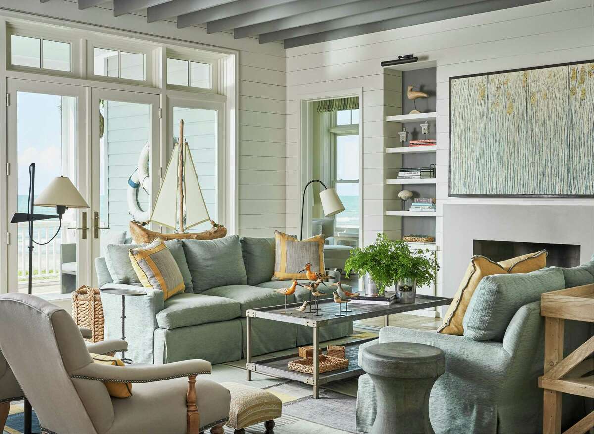 The color palette for this living room draws from the sea, sky and sand.