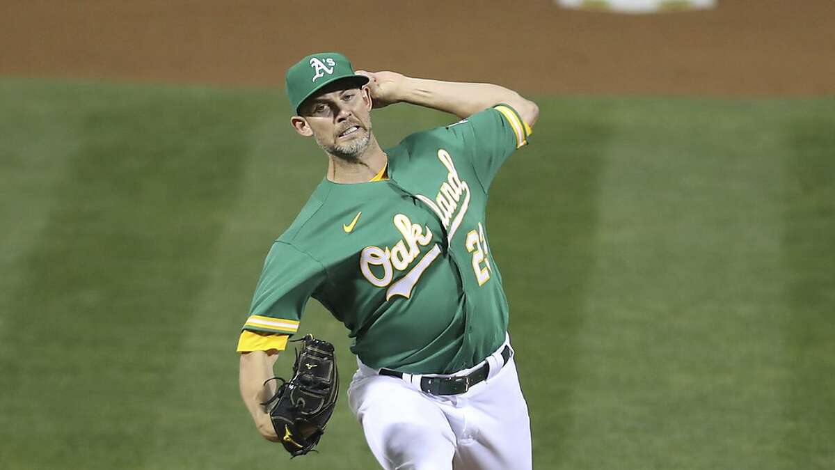 Oakland Athletics Mike Minor pitches against the Houston Astros during the second baseball game of a doubleheader in Oakland, Calif., Tuesday, Sept. 8, 2020. (AP Photo/Jed Jacobsohn)