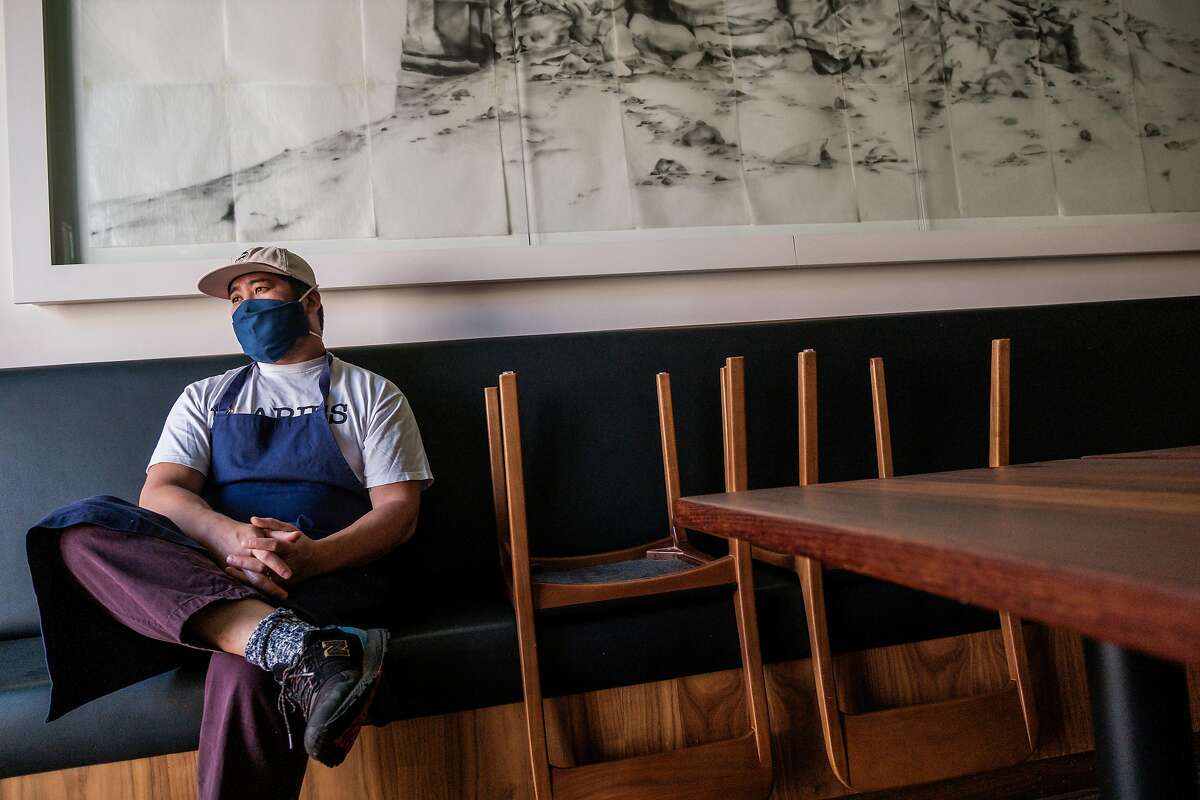 Brandon Jew pauses inside his Mister Jiu’s restaurant prior to an all-staff meeting Sept. 18. He was nominated for a James Beard Award before it was decided not to hand them out this year.
