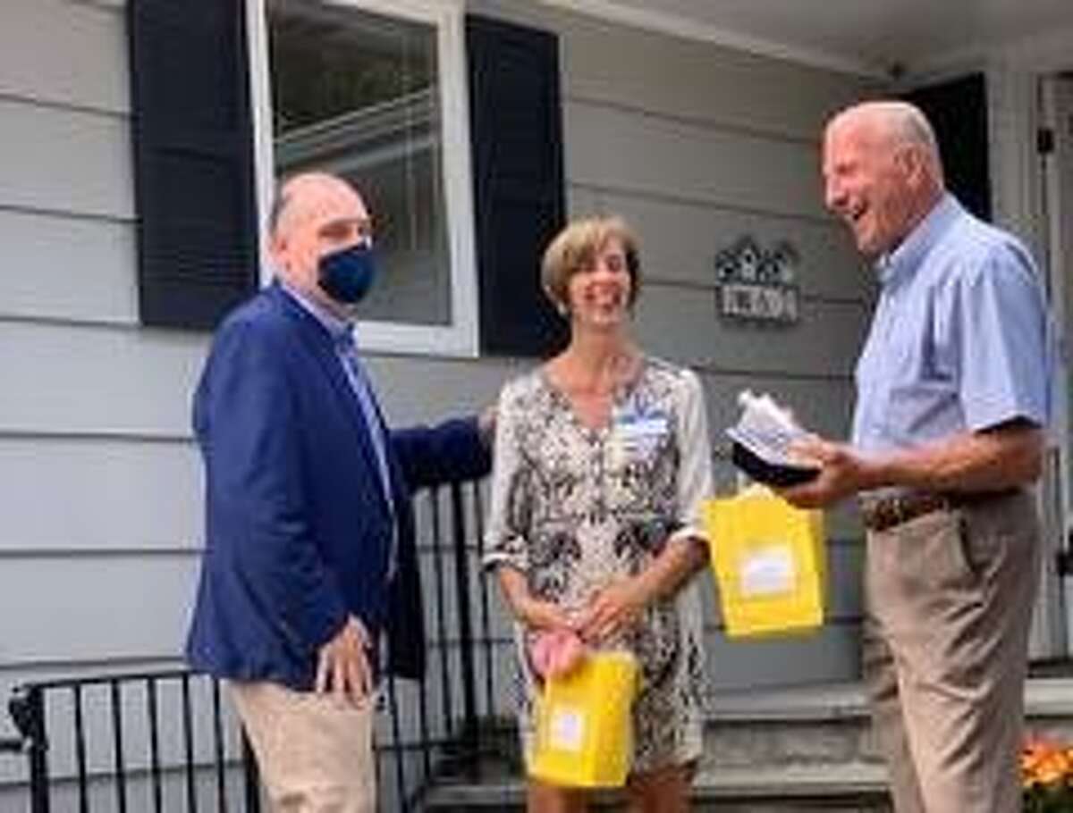 Business owner Deirdre Virvo with Chris Sinatra, left, of Higgins Group Realtor and Mayor Mark Lauretti at the grand opening of Just Like Home’s Dogwood Home on Thursday, Sept. 11.