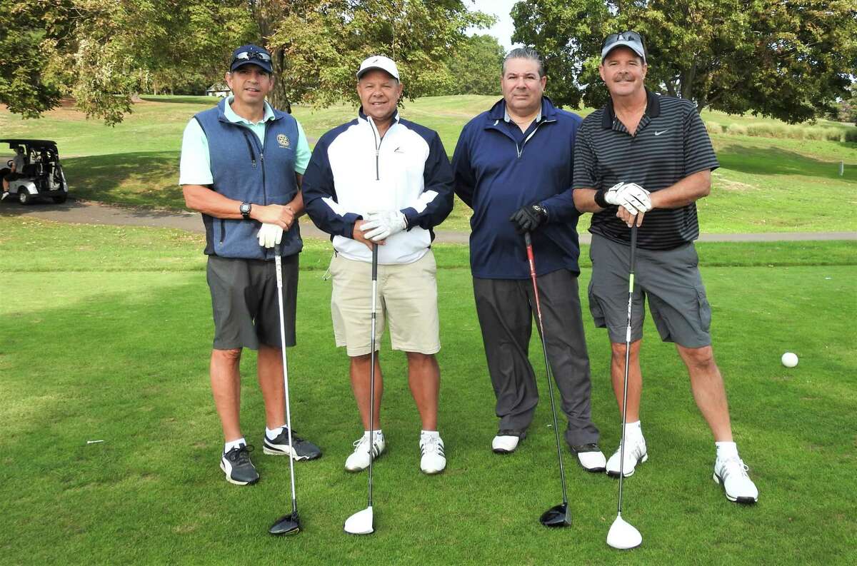 The Middlesex County Chamber of Commerce 37th annual Golf Tournament was held Sept. 16 at Lyman Orchards Golf Club in Middlefield. From left are golfers Bruce Filinger, Mark Osora, Golf Committee Chairman Dante Fazzina, and Rick Romano.