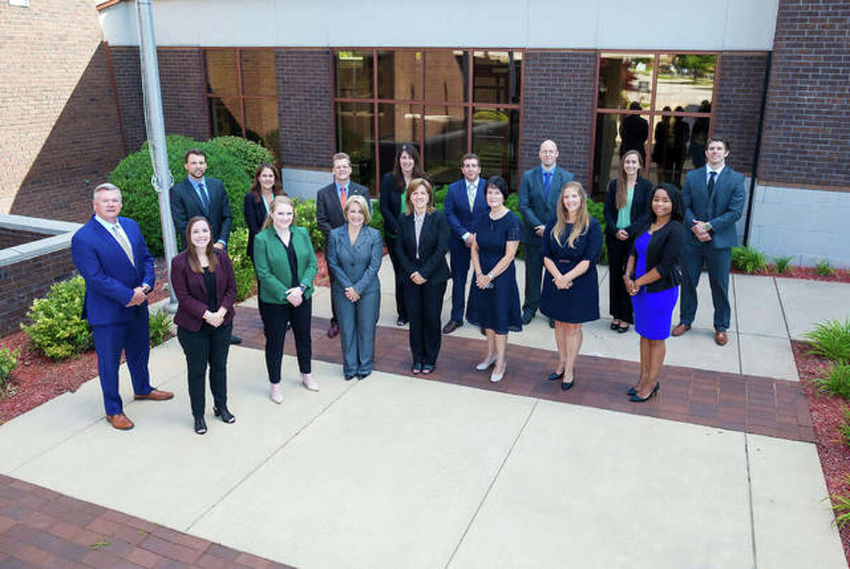 Members of the Busey Wealth Management Metro East team are, in front from left, Chris Jordan, Alicia Strohmeier, Kelly Ruth Fuqua, Gail Washenko, Joann Barton, Lisa Hock, Mary Potthast and Marley Hitchye. In back, from left, are Bradley Sauer, Kathleen Vogt, Kevin Doak, Renea Harbert, Nick Suess, Michael Hungerford, Kim Haas and Will Rankin.