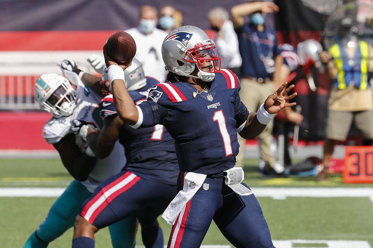New England Patriots quarterback Cam Newton throws against the Miami Dolphins during an NFL football game at Gillette Stadium, Sunday, Sept. 13, 2020 in Foxborough, Mass. (Winslow Townson/AP Images for Panini)