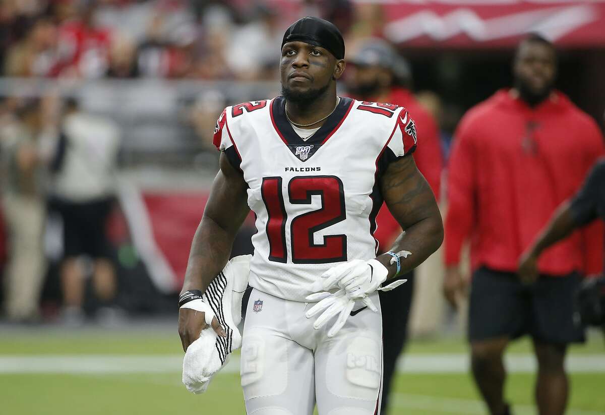FILE - In this Oct. 13, 2019 file photo, Atlanta Falcons wide receiver Mohamed Sanu pauses (12) during an NFL football game against the Arizona Cardinals in Glendale, Ariz. A person within the NFL says the Atlanta Falcons have traded Sanu to the New England Patriots for a second-round draft pick in 2020. (AP Photo/Rick Scuteri, File)