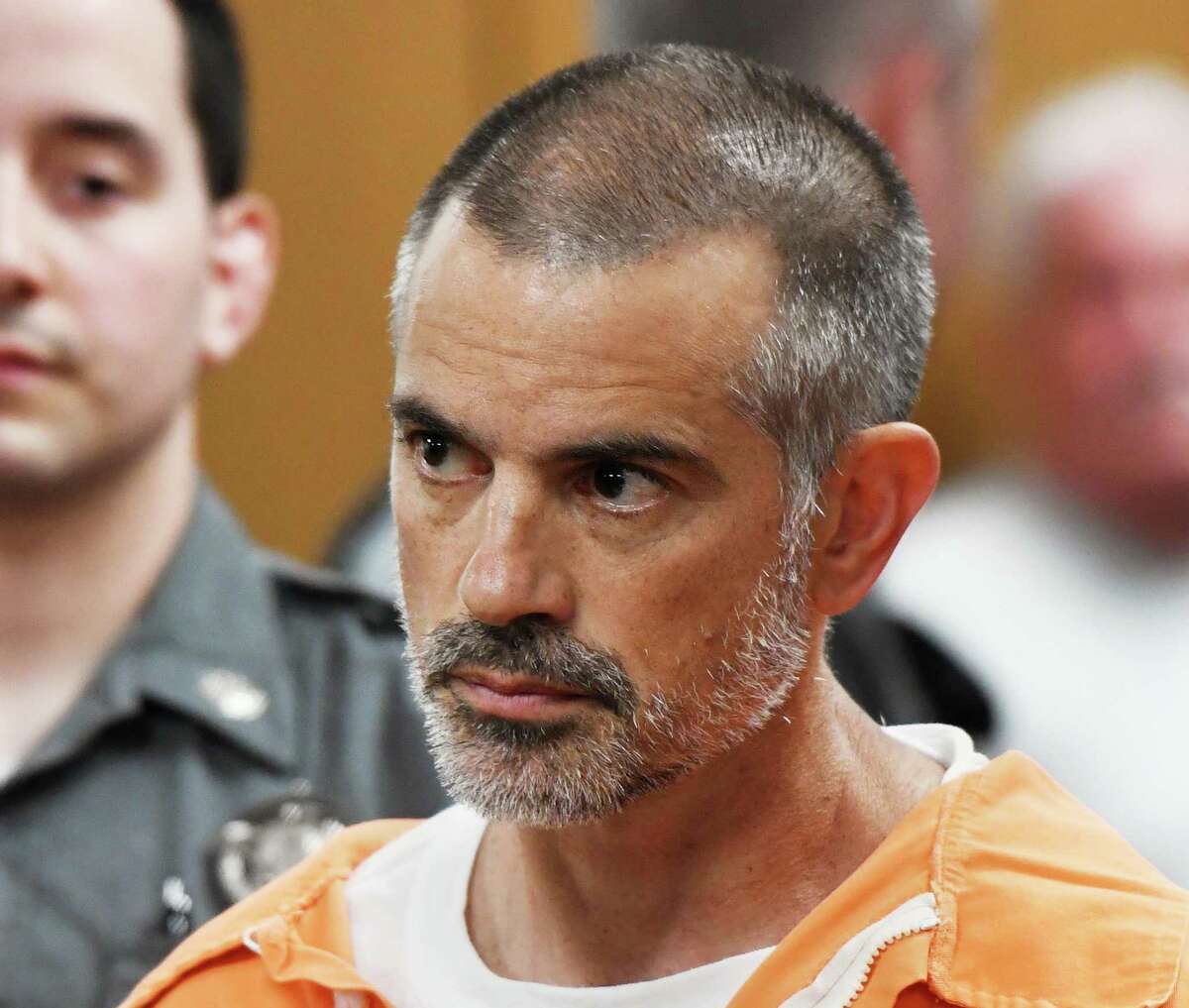 Fotis Dulos, 51, is arraigned on charges of tampering with or fabricating physical evidence and first-degree hindering prosecution at Norwalk Superior Court in Norwalk, Conn. Monday, June 3, 2019. JAN. 30 Fotis Dulos died from an apparent suicide at a New York hospital. Two days earlier, Fotis Dulos was found inside his running SUV in the garage of his Farmington home, police said. Police conducted a welfare check when he didn’t show up for a court hearing where a judge could have revoked his bond and sent him back to jail.