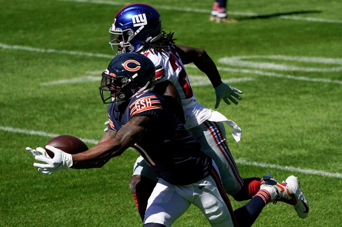 Chicago Bears wide receiver Anthony Miller (17) tries to catch a pass as New York Giants cornerback Isaac Yiadom (27) defends during the first half of an NFL football game in Chicago, Sunday, Sept. 20, 2020. (AP Photo/Charles Rex Arbogast)