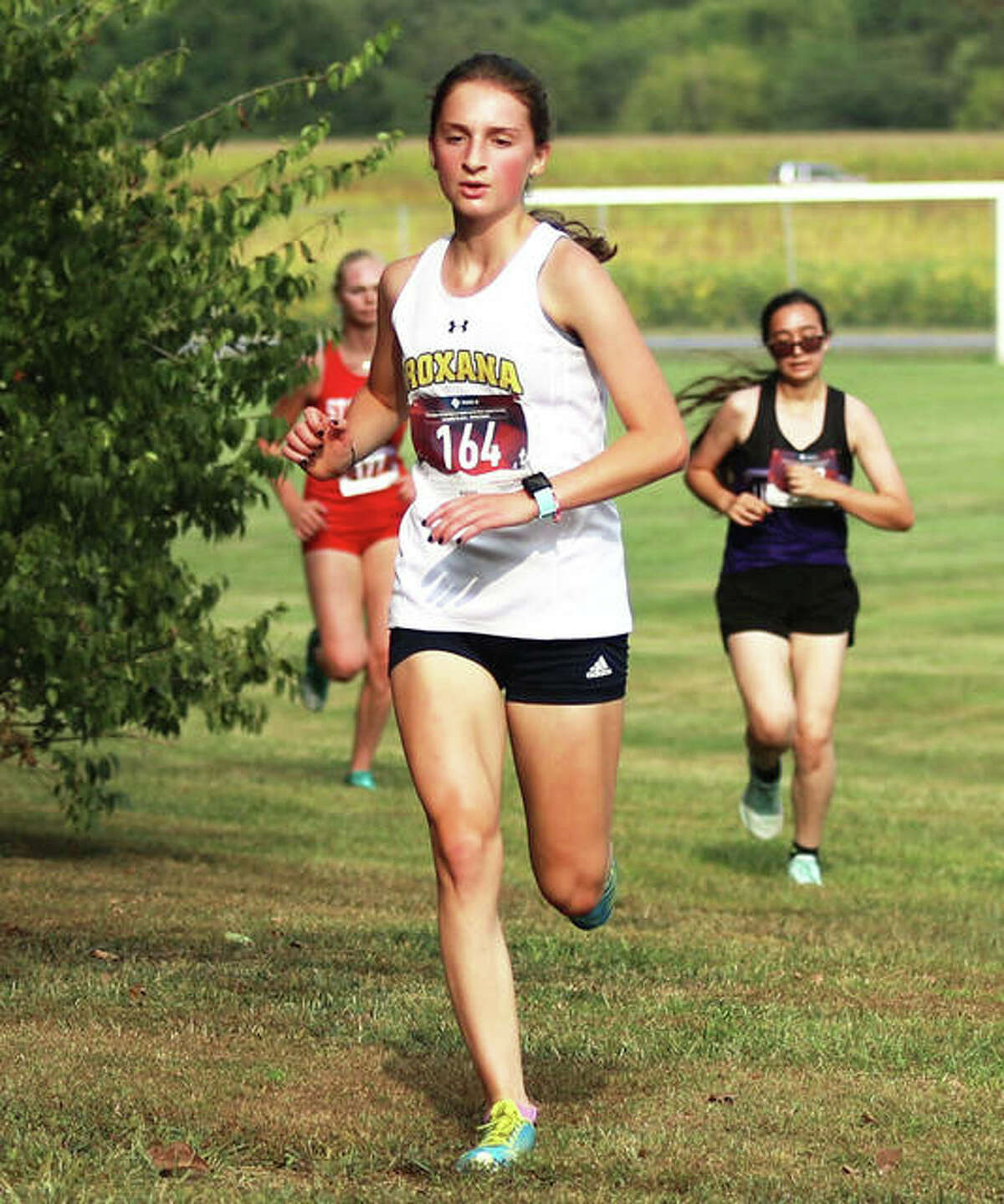 Roxana sophomore Gabrielle Woodruff runs to a personal record time Tuesday at the Staunton Invite at the Staunton Soccer Complex. Woodruff came back Saturday with another PR in the Highland Invite at Alhambra.