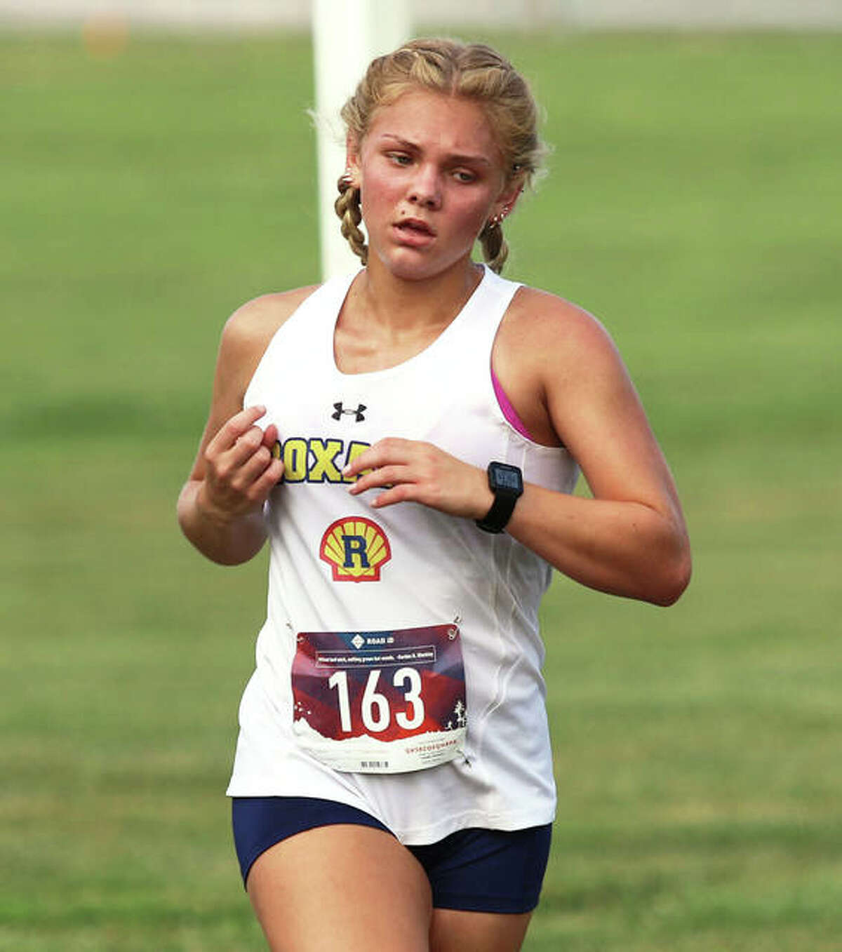 Roxana sophomore Zoey Losch runs during her fourth-place finish Tuesday in the Shells’ victory in a four-team meet at Staunton.
