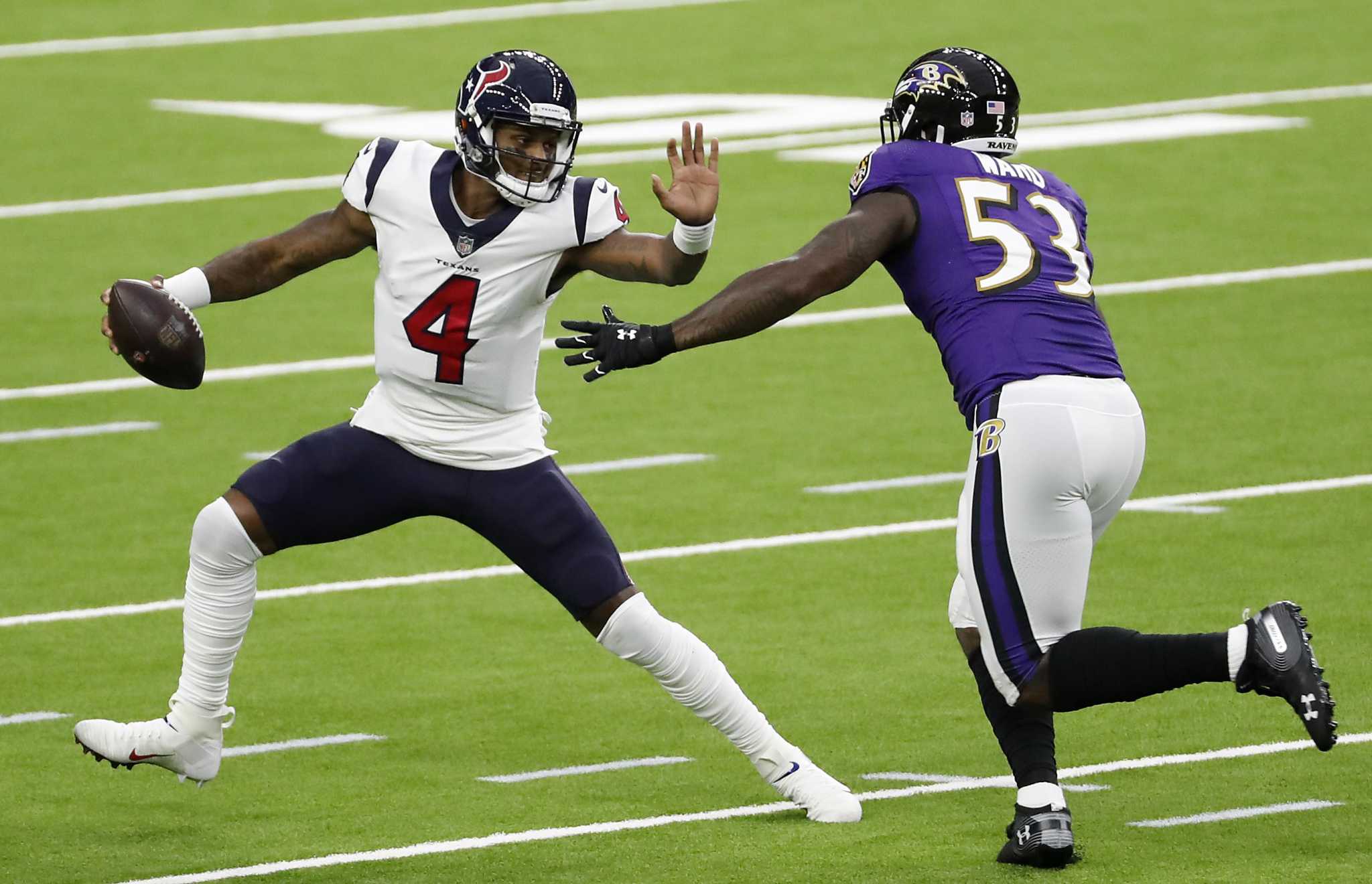 Baltimore Ravens running back J.K. Dobbins (27) runs out of the tunnel  prior to an NFL