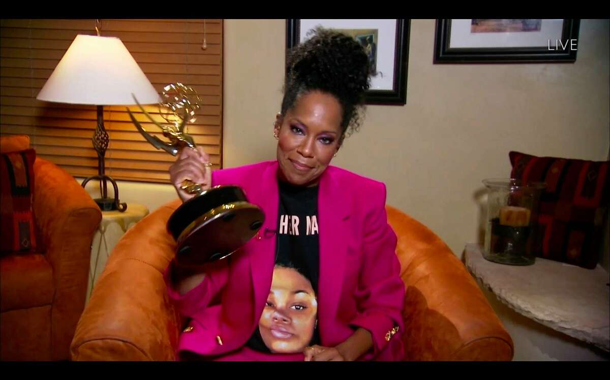 US actress Regina King wears a Breonna Taylor shirt as she wins the Emmy for Outstanding Lead Actress in a Limited Series or Movie with her role in "Watchmen" during the 72nd Primetime Emmy Awards on September 20, 2020.
