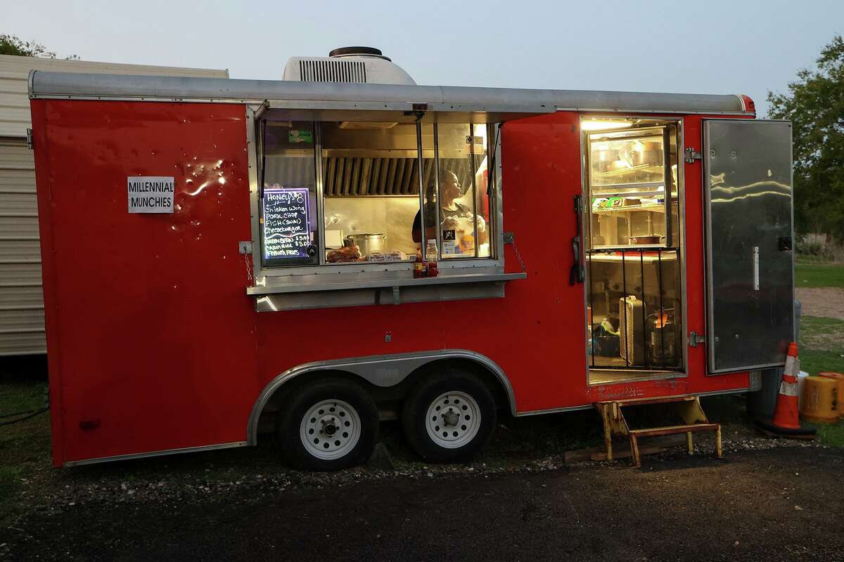 Owner La Rita "Honey" Brown gets the food truck kitchen set up for a Saturday night at Honey's Place on the deep East Side at 7119 Joe Louis Drive.