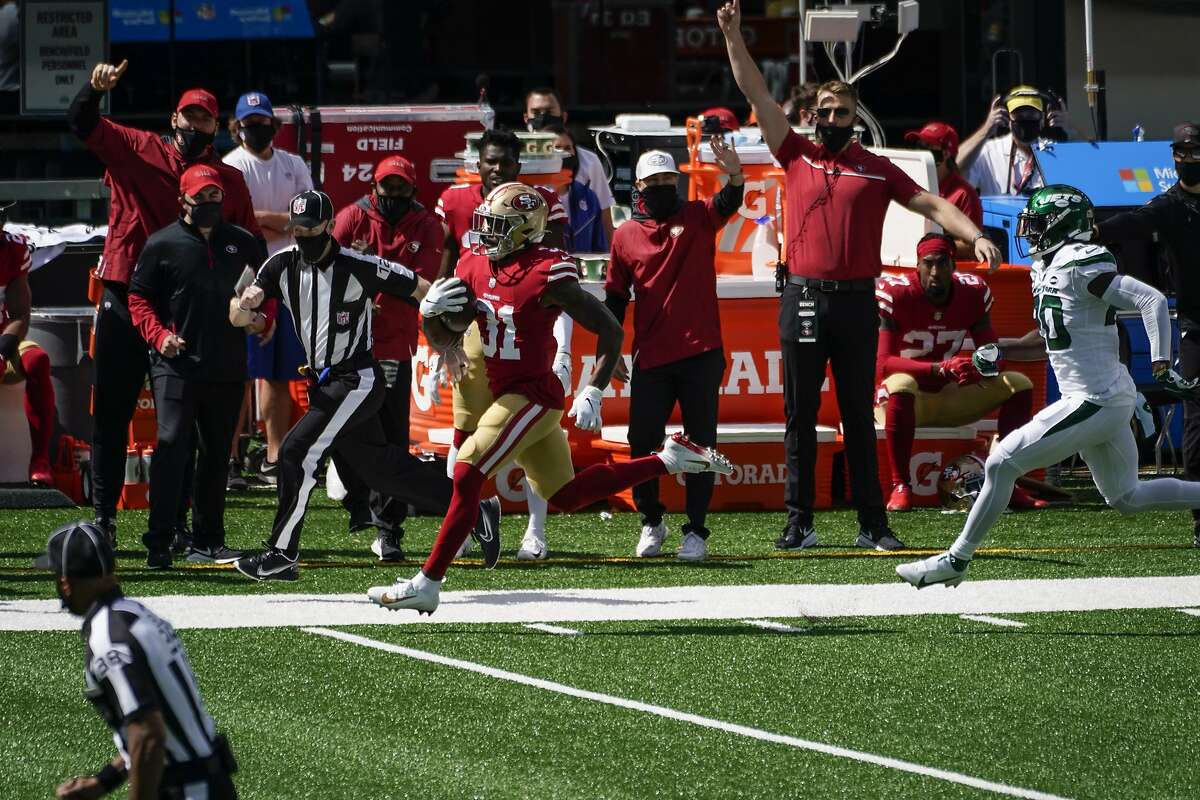 San Francisco 49ers running back Raheem Mostert (31) runs against