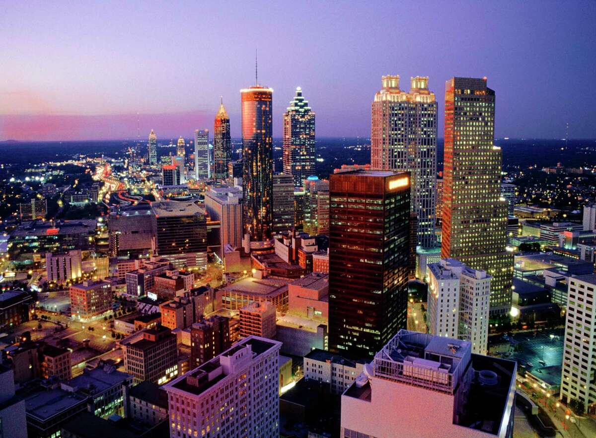 Midtown Atlanta skyline viewed form Marietta St. in downtown Atlanta at dusk. credit: Kevin C. Rose