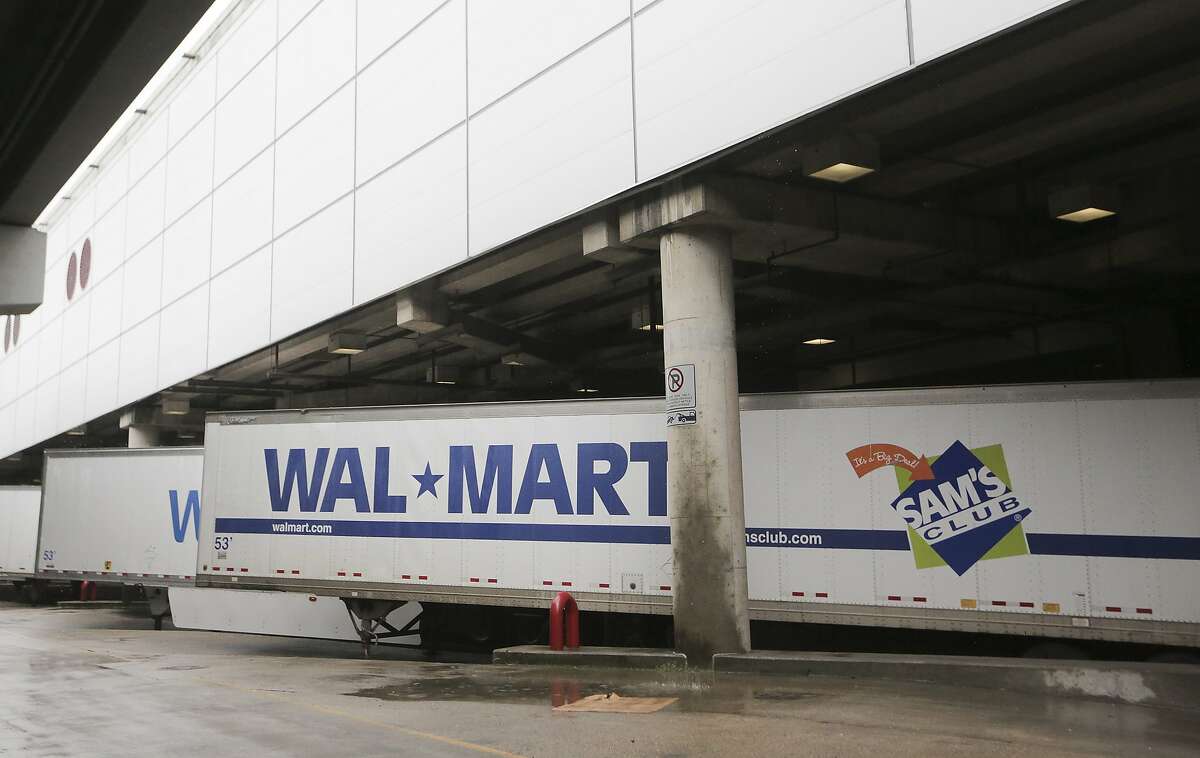 Walmart trucks in the loading dock of the George R. Brown Convention Center in Houston as Tropical Storm Harvey inches its way through the area on Tuesday, Aug. 29, 2017. ( Elizabeth Conley / Houston Chronicle )