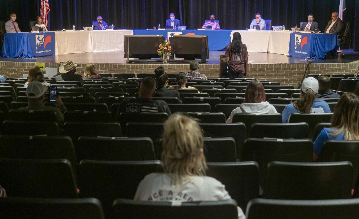 FILE PHOTO: Members of the MISD school board listen during the open forum 09/21/2020 at the school board meeting in Bowie Fine Arts Performing Arts Center. Tim Fischer/Reporter-Telegram