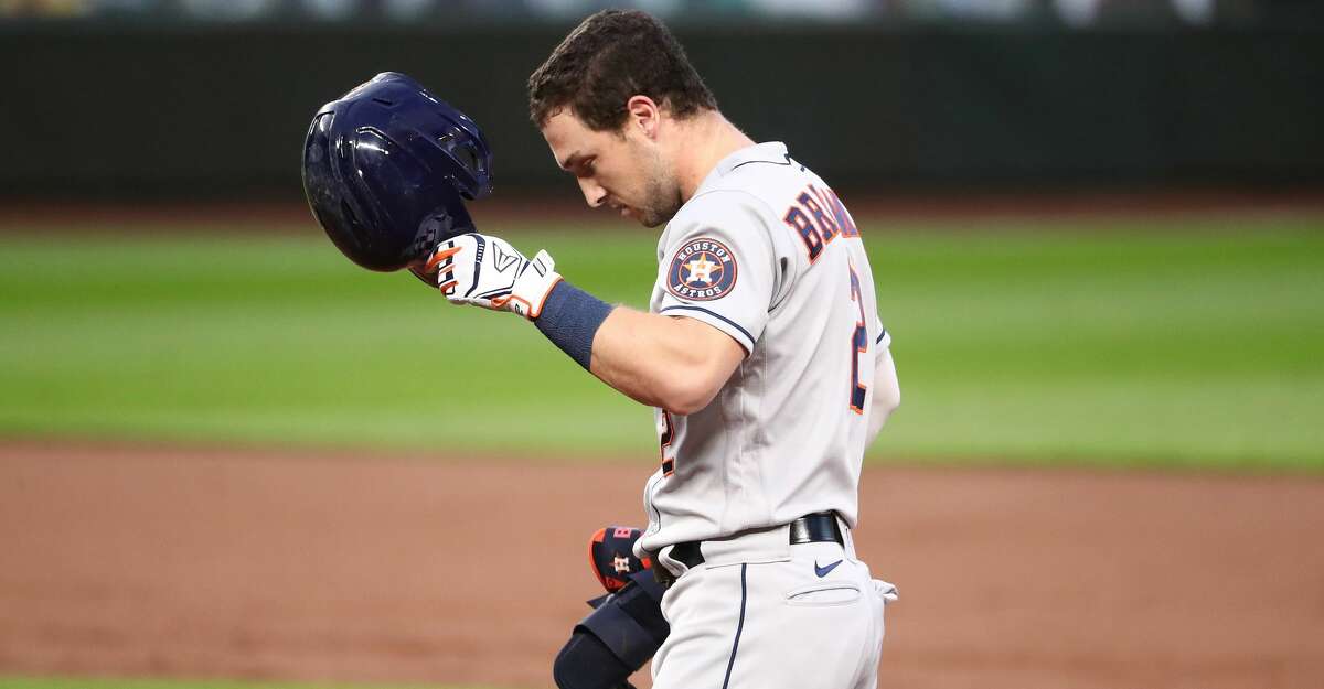 Alex Bregman #2 of the Houston Astros reacts after hitting a fly out in the third inning against the Seattle Mariners at T-Mobile Park on September 21, 2020 in Seattle, Washington. (Photo by Abbie Parr/Getty Images)