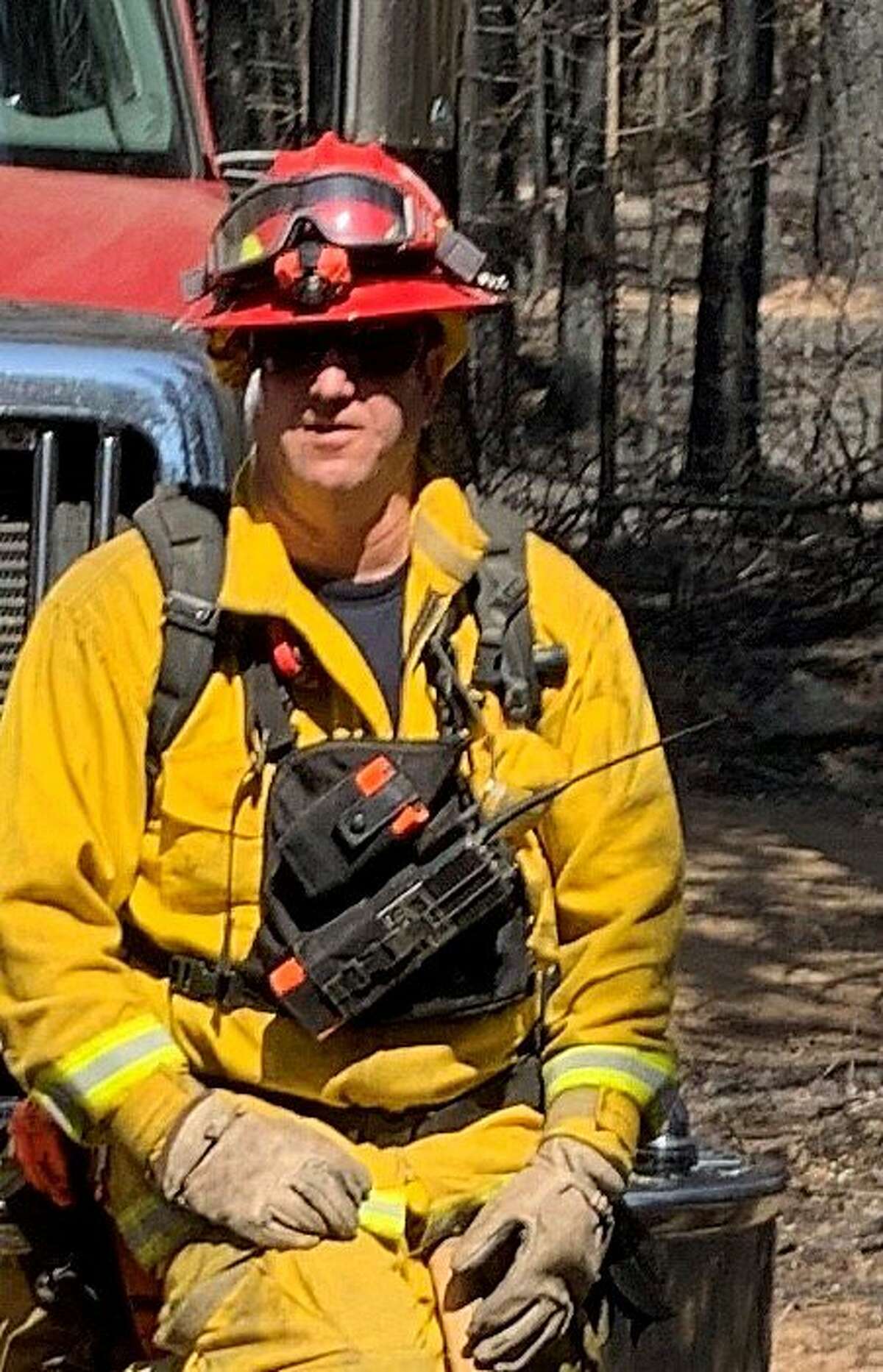 Volunteer firefighters from the Rutherford station in Napa County fight the Hennessey Fire in August 2020.