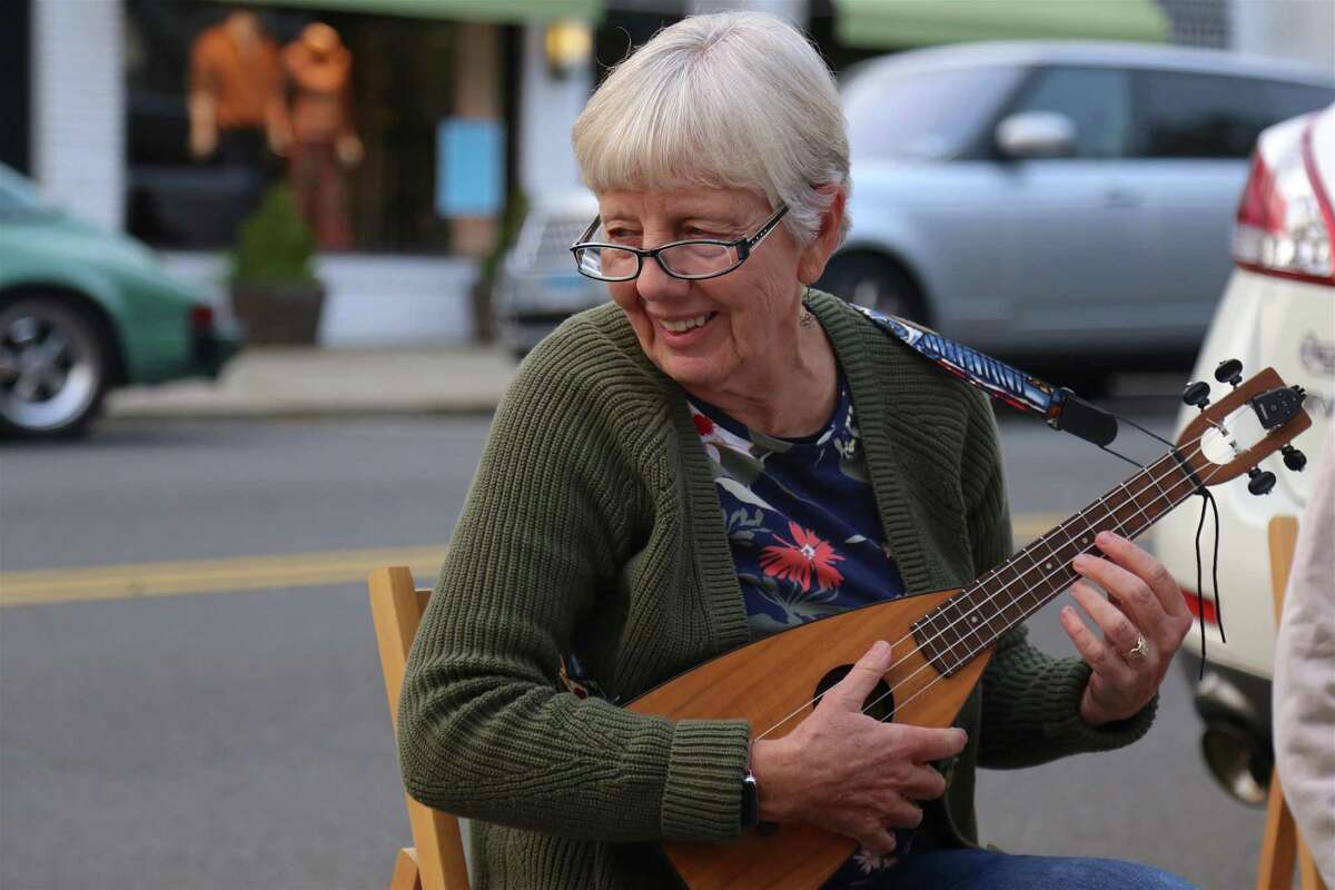 Vikki Herman of Fairfield is a regular at the monthly ukulele meet-up outisde the Horseshoe Cafe on Tuesday, Sept.15, 2020, in Fairfield, Conn. Vikki Herman of Fairfield, who has been attending the group for two years with her husband Bill, praised Forlano and his inclusive approach to making music.