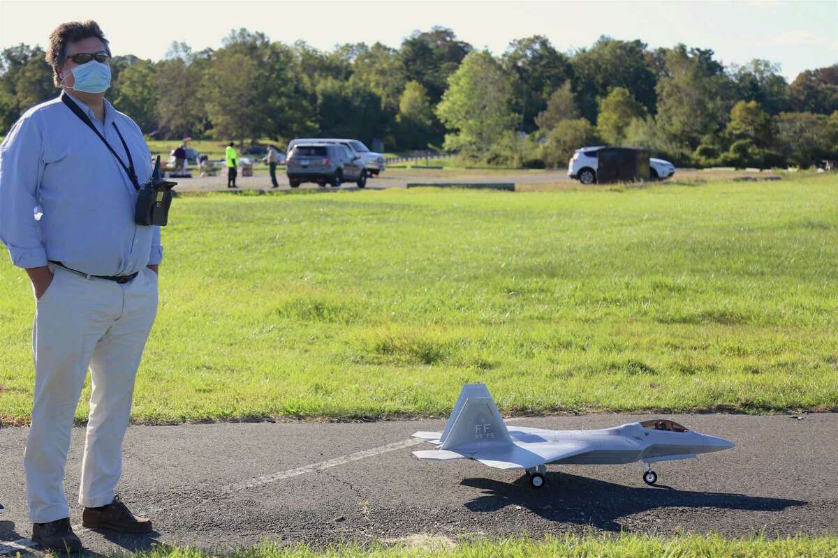 Bruce Griffiths of Danbury prepares to launch his fighter jet at the ShoreFest on a Roll event at Sherwood Island State Park on Sunday, Sept. 20, 2020, in Westport, Conn.