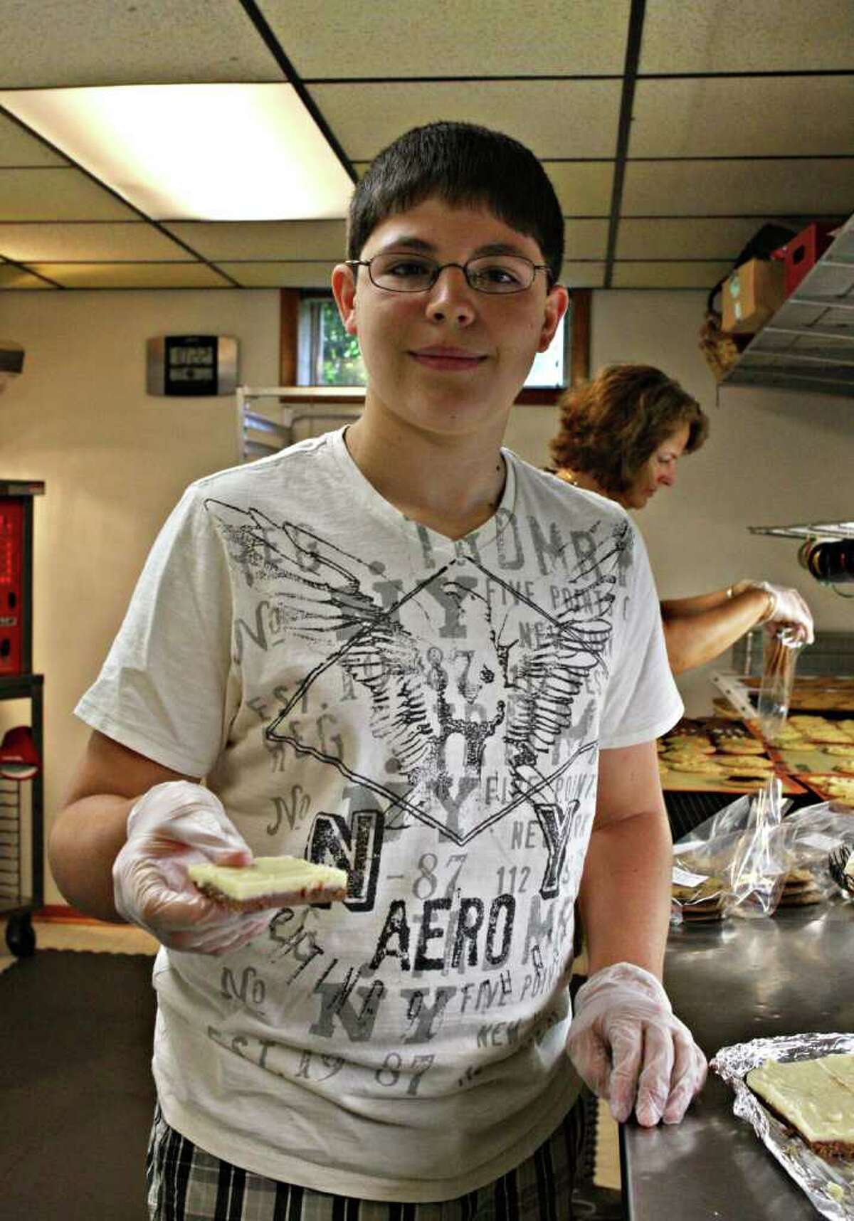 A mother/son operation at Saratoga Cookie Co.: Emily Damiano makes the cookies, while son A.J. Damiano runs a side business producing homemade fudge. (Krishna Hill / life@home)