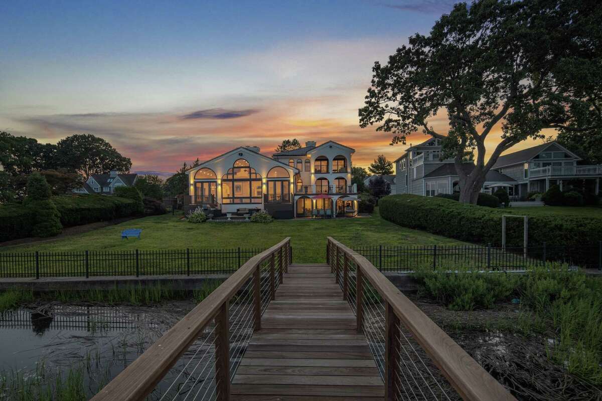 This over-sized property of just over half an acre has a deep water dock. "It is the summer's great last heat, It is the fall's first chill: They meet," said American poet Sarah Morgan Bryan Piatt (1836-1919). Heat or chill, those who live in the Saugatuck Shores section of Westport always find a way to extend the summer season, even while enjoying the sweater weather brought on by cooling temperatures.