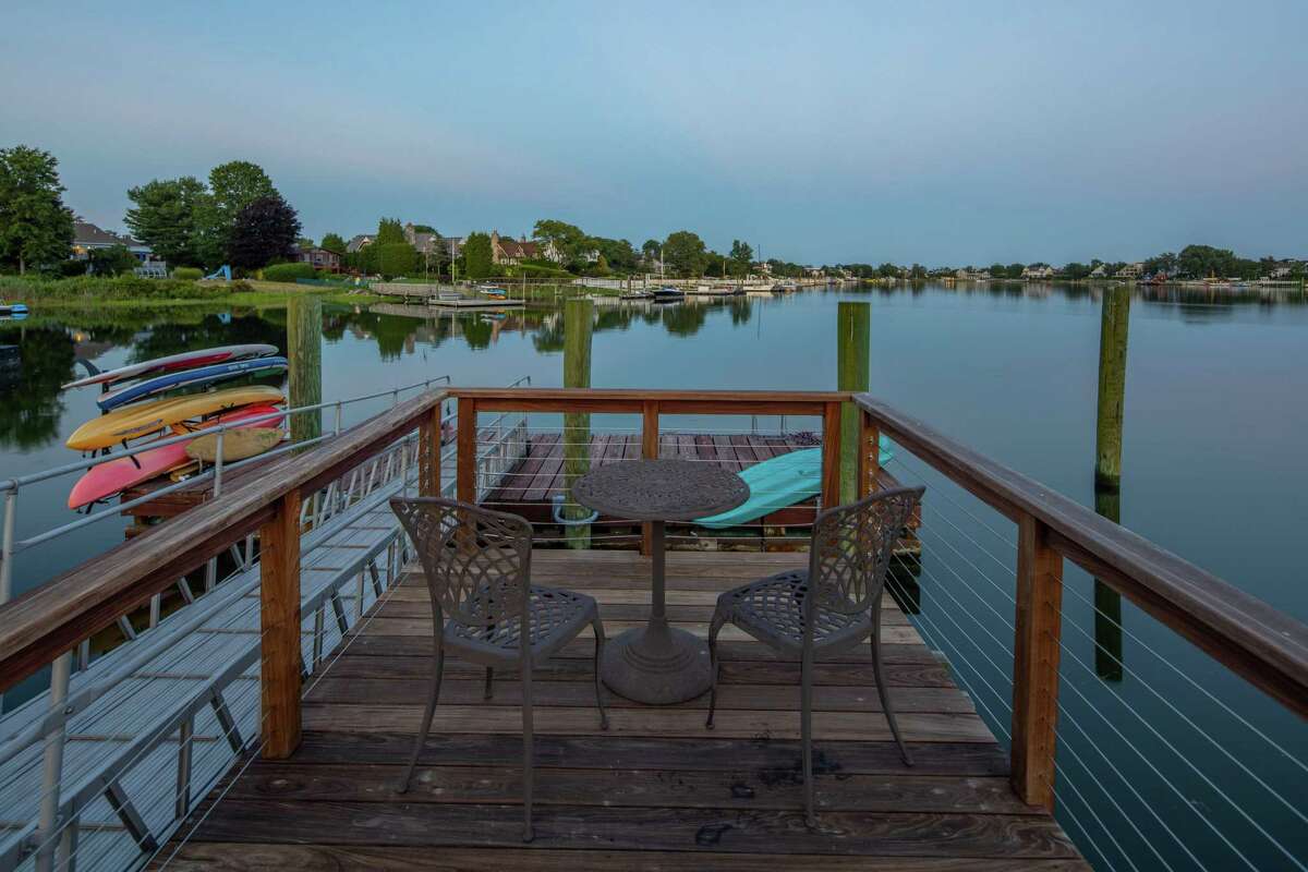 Sit at the end of the dock to take in relaxing water views. It might be too cold to go swimming this time of year but residents can fish and boat on Long Island Sound, they can walk and bike on the local roadways that are generally only traveled by those who live in this section, and there are always beautiful sunrises and sunsets to capture, whether just visually or on canvas.