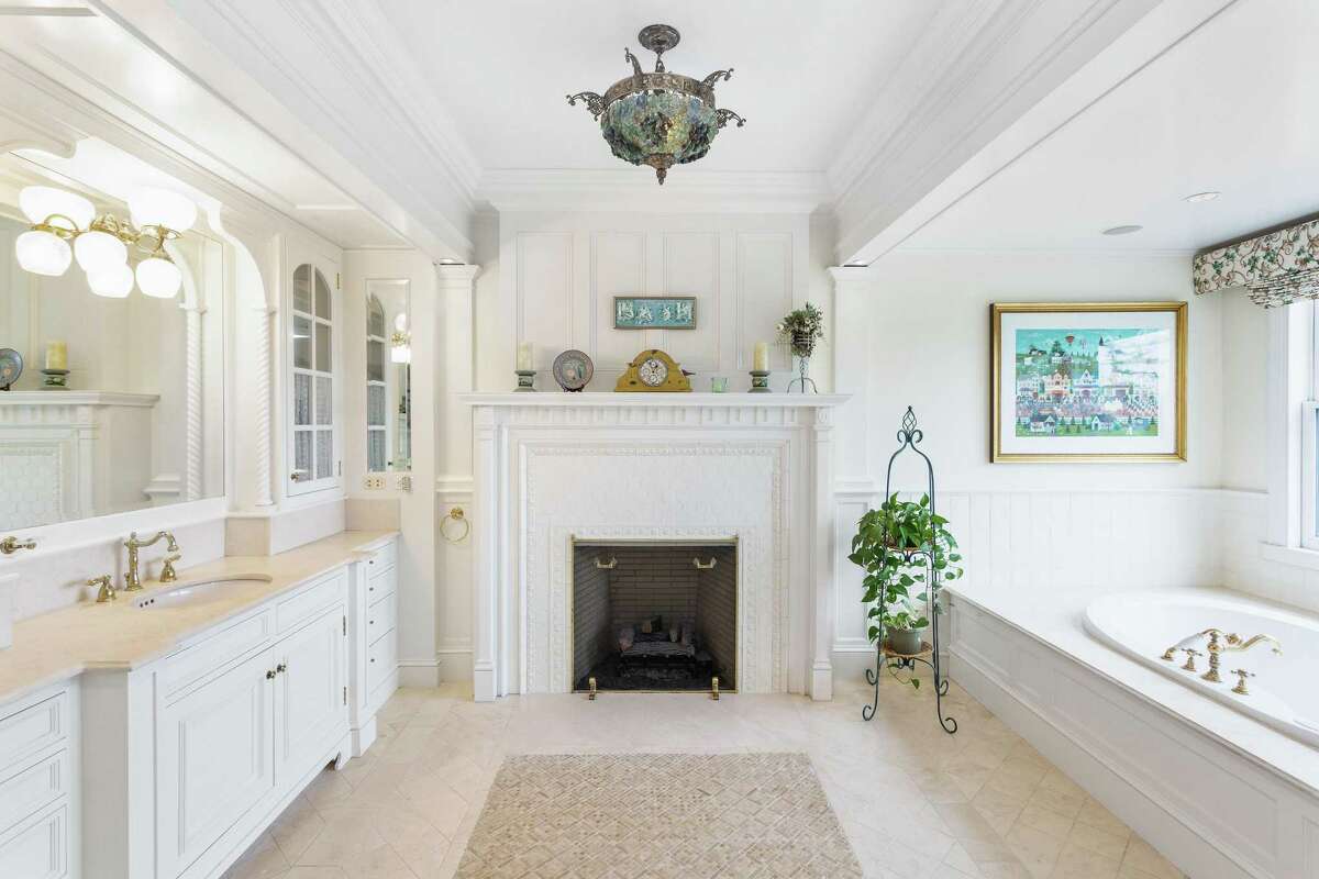 In the luxurious master bath there is a fireplace and soaking tub. Fairfield has its own replica of the inn: A Queen Anne-style Victorian house at 1111 Sasco Hill Road in the elegant enclave of Sasco Point in the Sasco neighborhood. While it sits on a modest 3.19-acre level property, comparatively speaking, this house does have its own waterfront as well as stunning water views. Many of the home's 29 rooms have views of Long Island Sound.