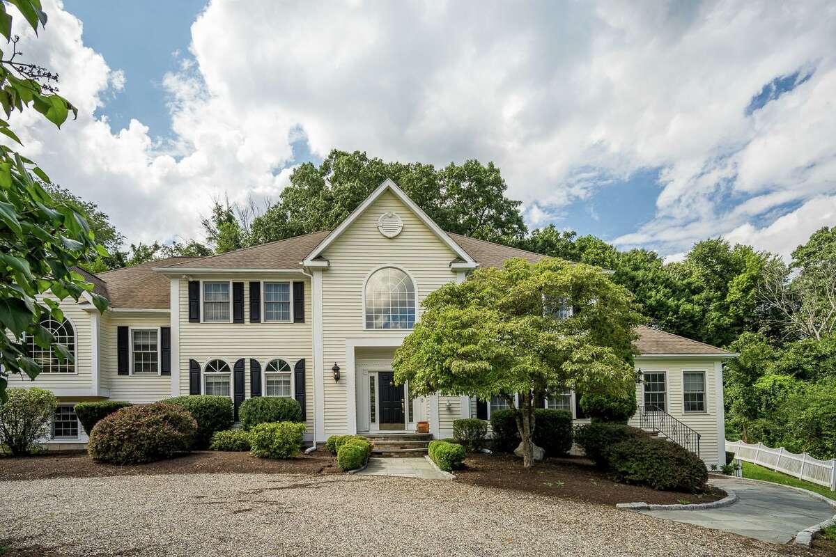 The yellow colonial house at 97 Tranquility Drive in Easton features 4,232 square feet of living and entertaining space. Although the color of the house is a muted yellow, the hue is said to represent freshness, happiness, positivity, clarity, energy, and optimism, according to several websites. Couple that with the fact that this house sits on Tranquility Drive and there has to be some level of calm that comes over its owners.