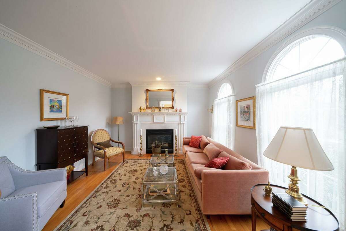 In the formal living room there is a fireplace with a decorative mantel, dentil crown molding, and arched transoms above the windows. This house sits on a level and gently sloping property of just over three acres in a part of Easton north of Westport Road (Route 136); in a very rural part of the town yet still convenient to the nearby towns of Westport, Weston, Fairfield and Monroe. It is also very convenient to several local farms and Gold Rush Farms for those who enjoy horseback riding or need a place to board their own horse.