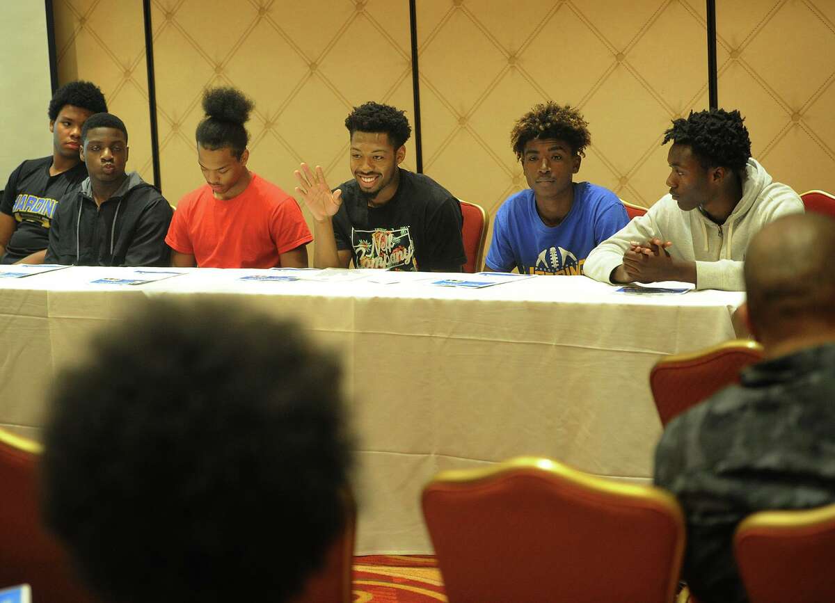 From left; Bridgeport high school students Troy Rainey, 15, Karlshon Fleming, 16, Xavien Reid, 16, Jordan Gallimore, 17, Knazier Clarke, 15, and Jaharie Mack, 17, sit on a Males of Color panel at the Educators for Excellence forum at the Trumbull Marriott in Trumbull, Conn. on Wednesday, May 23, 2018.