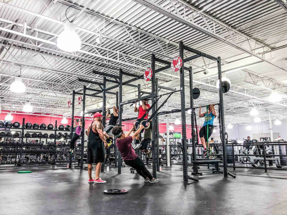 World Gym enters Houston with 5story gym in former YMCA building