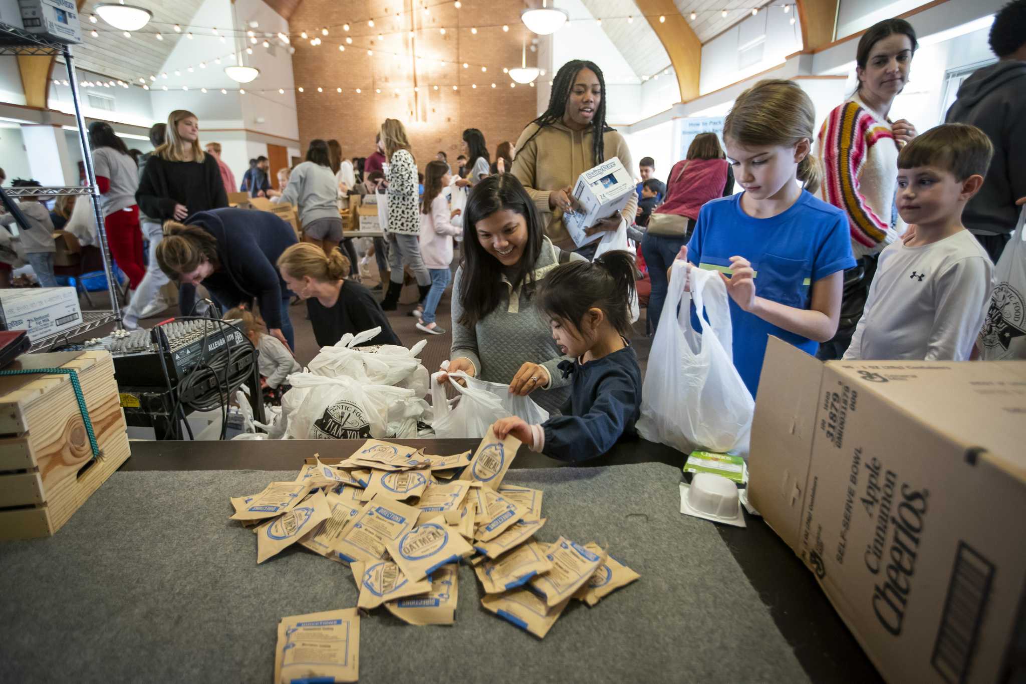 Blessings in a Backpack volunteers provide meals for students