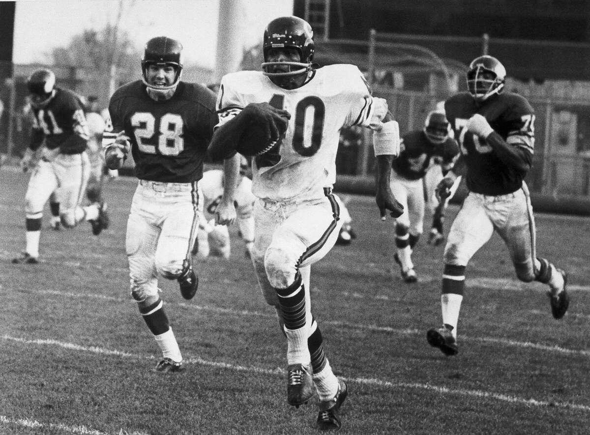 Hall of Fame running back Gale Sayers of the Chicago Bears left many defensive players in his wake.