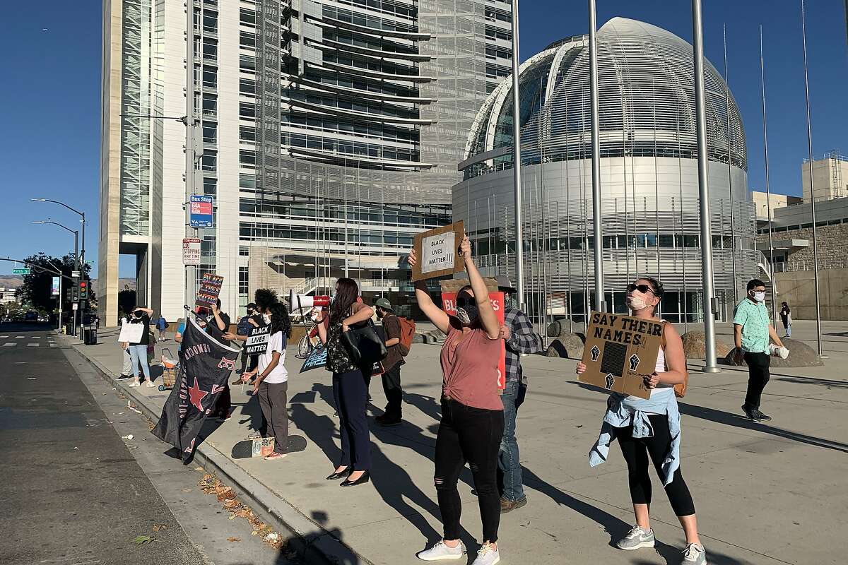In Downtown San Jose on Wednesday, Sept. 23, more than a dozen masked protesters gathered in front of the San Jose City Hall rotunda, where they chanted, “Black Lives Matter” and “Say Her Name, Breonna Taylor.”