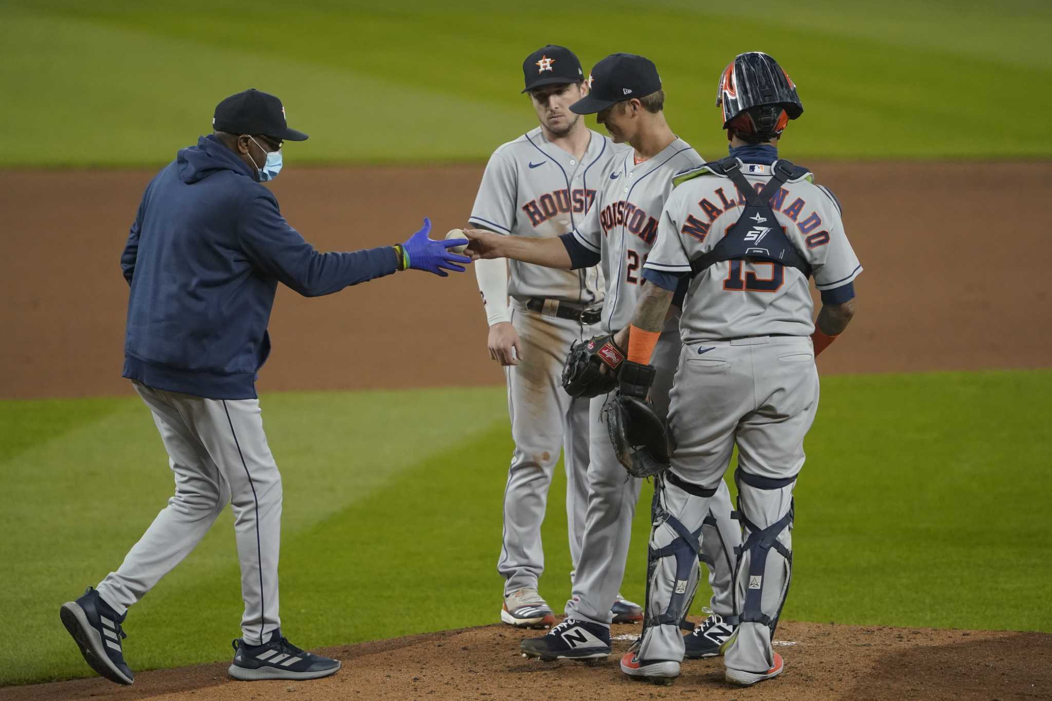 Seattle Mariners' Ty France (23) and Kyle Seager celebrate after a baseball  game against the Houston