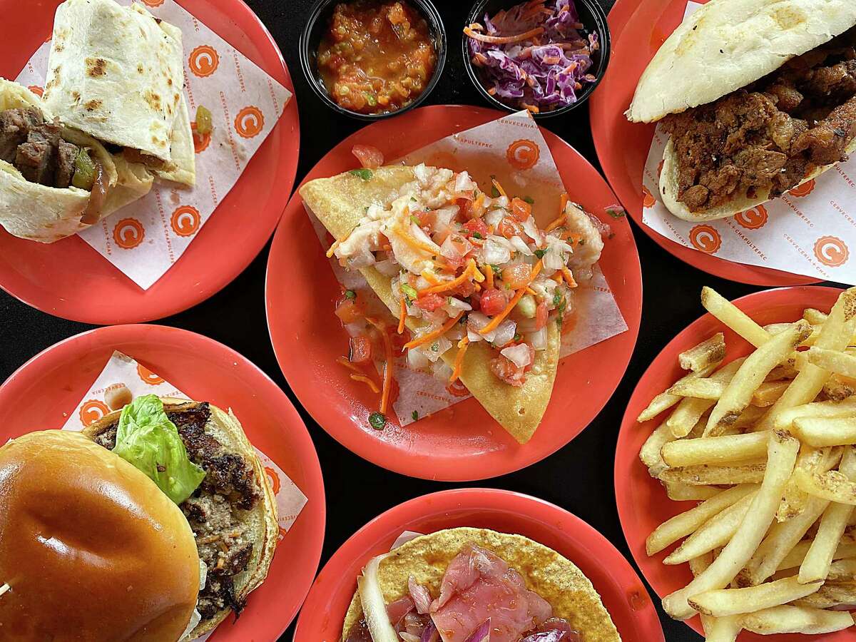 Food from the new Mexican restaurant Cervecería Chapultepec includes, clockwise from top left, a steak burrito, fried tacos with fish ceviche, an al pastor sub, french fries, a tuna tostada and a burger.