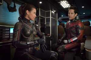The Wasp/Hope Van Dyne (Evangeline Lilly, left) joins Ant-Man/Scott Lang (Paul Rudd) in "Ant-Man and The Wasp." (Ben Rothstein/Marvel Studios/TNS)
