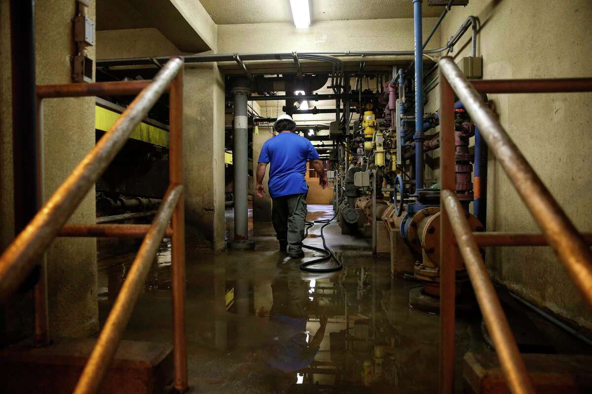 A file photo from 2018 shows a worker at Houston’s 69th Street Wastewater Treatment Plant. The city is testing samples from the plants for COVID-19.