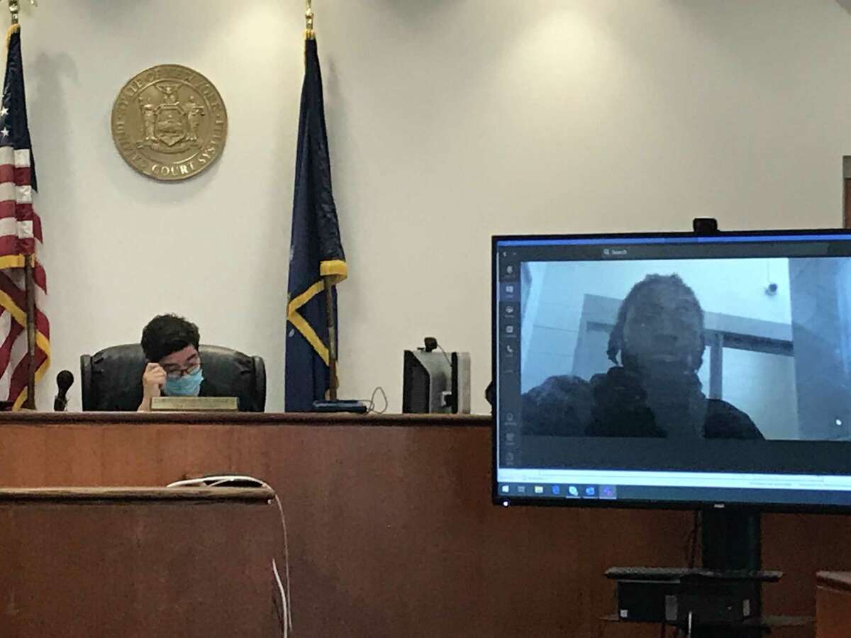 Troy City Court Judge Christopher Maier presiding at the virtual arraingment of Jahquay E. Brown, seen on video screen, for second-degree murder in the homicide of Ayshawn Davis, 11, on Thursday Sept. 24, 2020 in Troy, N.Y.